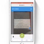 Picture of a phone with the EquatIO mobile app taking a photo of handwritten maths on a page