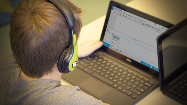 Photo of a student using EquatIO on their laptop