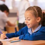 Image of pupil at desk