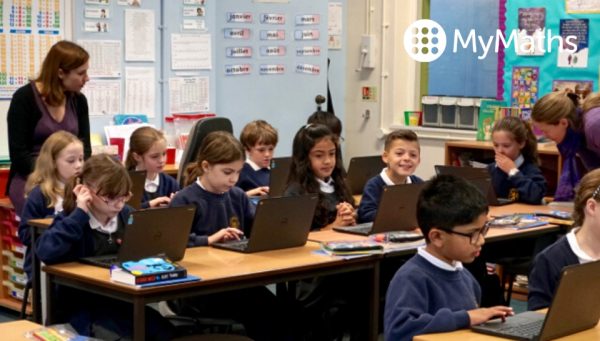 Primary school class using MyMaths on laptops