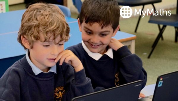 Primary school children using MyMaths on laptops