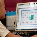 Primary school child using MyMaths on a desktop computer