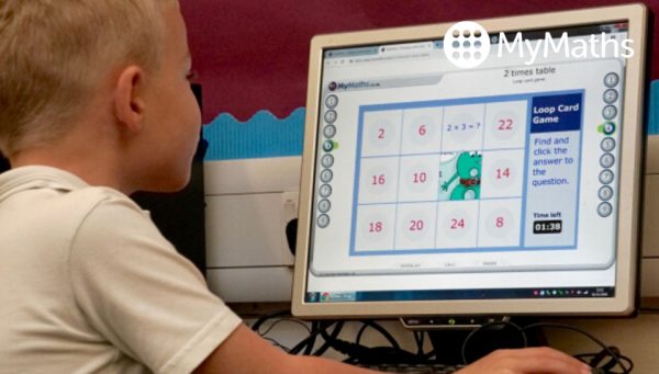 Primary school child using MyMaths on a desktop computer